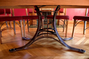 Quarter-sawn White Oak table, walnut inlay and wrought Iron base. Wrought iron seat frames.